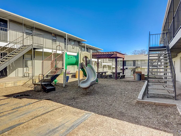 Playground and courtyard at Polk Villas